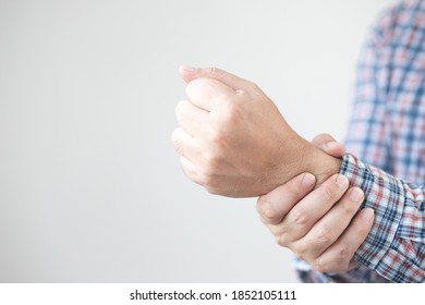 Image Of Man Holding On The Wrist,fist Bump.