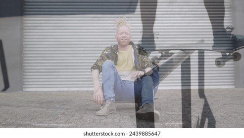 Image of man skateboarding over albino man sitting on skateboard. hobby and lifestyle concept digitally generated image. - Powered by Shutterstock