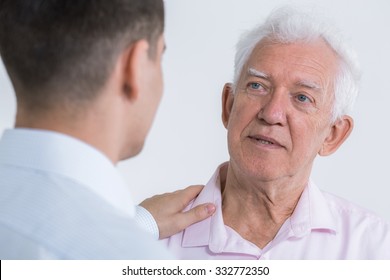 Image Of Man Talking With Senior Father