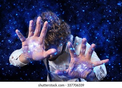 image of a man who performs magic with his hands