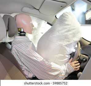 The image of mannequin in a car after crash-test