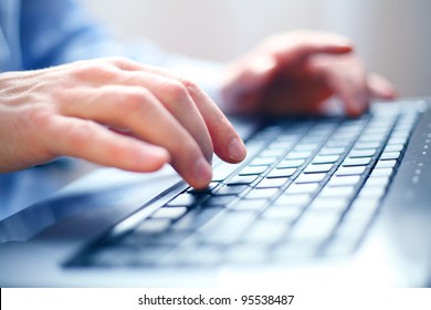 Image of man's hands typing. Selective focus - Shutterstock ID 95538487