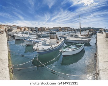 Image of the marina of the Croatian port city of Rovinj during the day