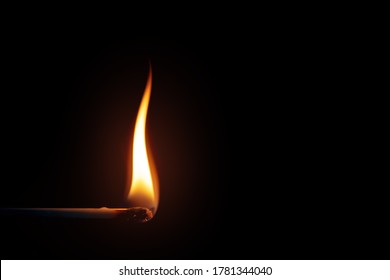 An Image Of A Match Flame Dark Background