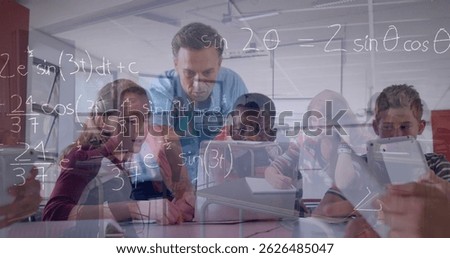 Image of math formulas moving over diverse male teacher and pupils working on laptop. learning, school, education and technology concept digitally generated image.