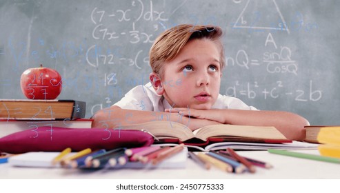 Image of math formulas over thoughtful caucasian boy learning at school. learning, education and school concept digitally generated image.