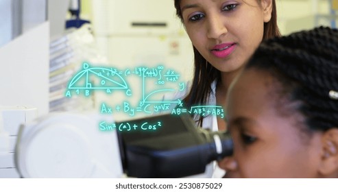 Image of mathematical equations over diverse female doctors using microscope. Global science and digital interface concept digitally generated image. - Powered by Shutterstock