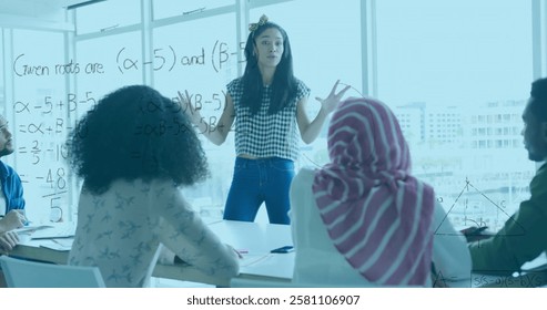 Image of mathematical equations over diverse casual businesswoman and colleagues at meeting. Network, data, finance, digital interface, business and communication, digitally generated image. - Powered by Shutterstock - Get 15% off with code: PIKWIZARD15