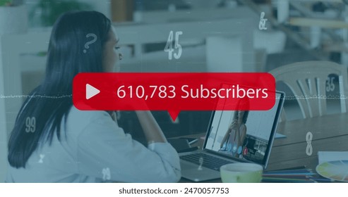 Image of media icon and data processing over biracial businesswoman having image call. Global business and digital interface concept digitally generated image.