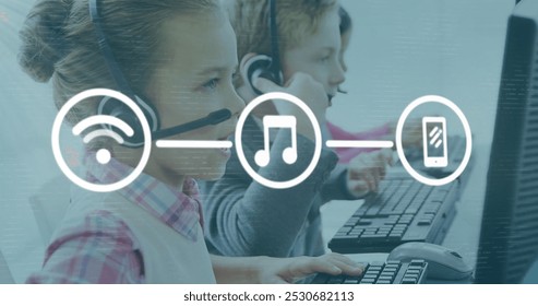 Image of media icons over diverse children using phone headsets in office. Global business, technology and digital interface concept, digitally generated image. - Powered by Shutterstock