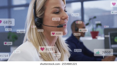 Image of media icons over diverse business people using phone headsets in office. Global social media, business and digital interface concept digitally generated image. - Powered by Shutterstock