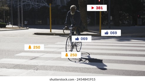 Image of media icons over senior african american man cycling. social media and communication interface concept digitally generated image. - Powered by Shutterstock