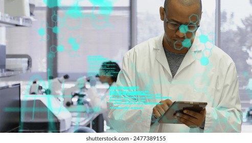 Image of medical data processing over biracial male scientist using digital tablet at laboratory. Medical research and science technology concept