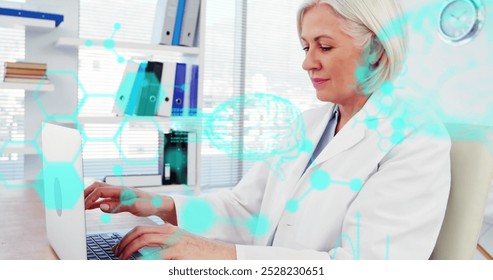 Image of medical data processing over caucasian female senior doctor using laptop at hospital. Medical healthcare and research technology concept - Powered by Shutterstock