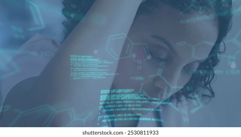 Image of medical data processing over tired biracial female doctor. Global healthcare, science, medicine, research and data processing concept digitally generated image.