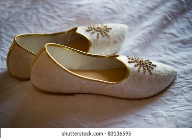 Image Of Men's Indian Wedding Shoes On A Bed