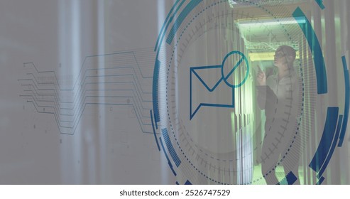 Image of message block icon over caucasian female engineer using digital tablet at server room. Cyber security and business data storage technology concept