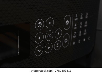 Image of a microwave control panel showing buttons and digital display for operation control.