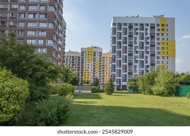 Image of a modern residential complex with multiple colorful apartment buildings, Moscow Russia - Powered by Shutterstock - Get 15% off with code: PIKWIZARD15