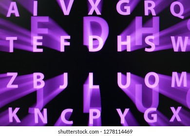 The image from the monitor screen, the movement of letters and particles on a long exposure, abstract digital technology background.  For IT design.