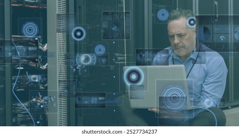 Image of moving screens over caucasian male server room worker. Global science, connections, data processing and digital interface concept digitally generated image.
