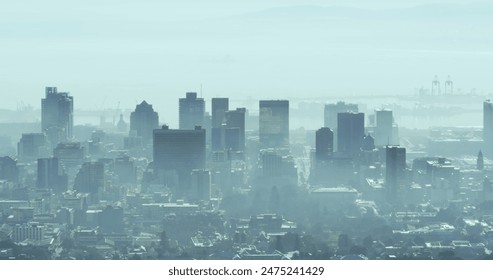 Image of multiple changing numbers floating against aerial view of cityscape. Computer interface and business technology concept