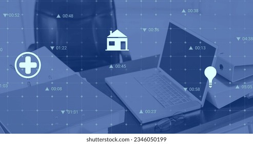 Image of multiple digital icons and data processing against close up of a desk at office. Computer interface and business technology concept