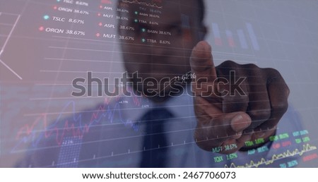 Image of multiple graphs and trading boards, african american man pointing finger towards camera. Digital composite, multiple exposure, report, business and stock market concept.