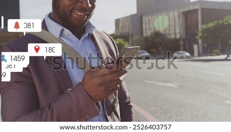 Image of multiple notification bars over smiling african american man scrolling on smartphone. Digital composite, multiple exposure, business, social media reminder and technology concept.