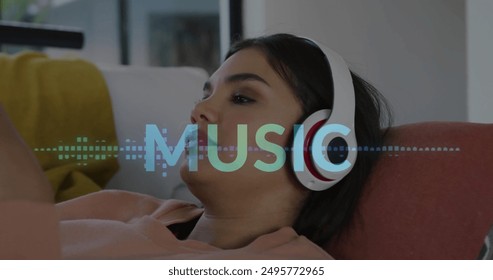 Image of music text and data over biracial woman using headphones at home. Free time, relaxing, home and lifestyle concept digitally generated image.