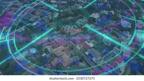 Image of neon shapes and data over cityscape. Data processing, digital interface and technology concept digitally generated image.