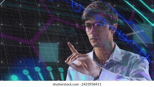 Image of neon shapes over caucasian man using touchscreen. Business, network, data processing, digital interface and technology concept digitally generated image.