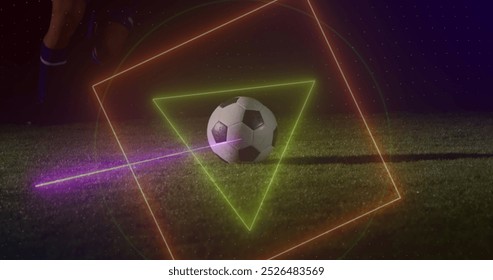 Image of neon shapes over caucasian male soccer player. global sport and digital interface concept digitally generated image.