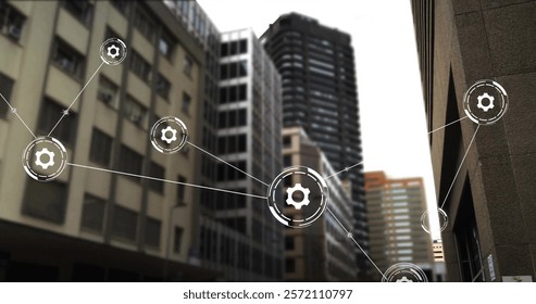 Image of network of connections with data processing over cityscape. Global finance, business, connections, computing and data processing concept digitally generated image.