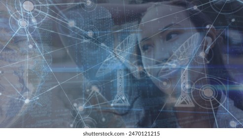 Image of network of connections with globe and data over biracial woman using smartphone. Global connections, networks and data processing concept digitally generated image.