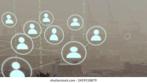 Image of network of connections with icons and binary coding over cityscape. Global networks, business, finances, computing and data processing concept digitally generated image.