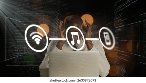 Image of network of connections with icons over african american businessman and data processing. Global technology, computing and digital interface concept digitally generated image. - Powered by Shutterstock - Get 15% off with code: PIKWIZARD15