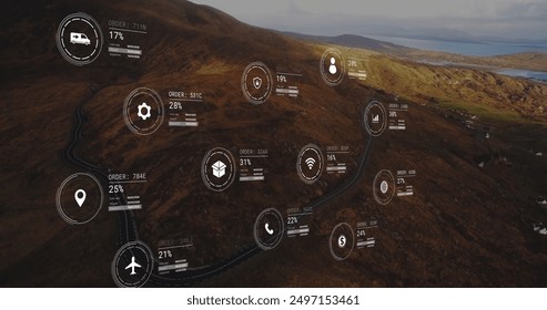 Image of network of icons and data processing over landscape. Global connections, computing and data processing concept digitally generated image.