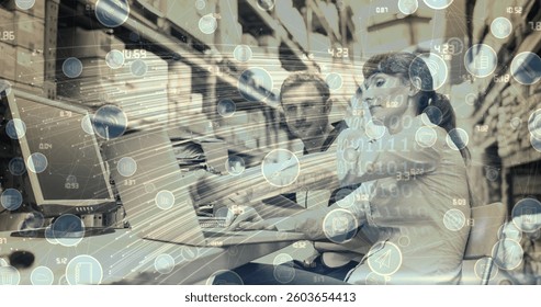 Image of networks of connections with digital icons over couple using computer. global connections, digital interface and technology concept digitally generated image.