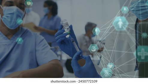 Image of networks of connections with icons over diverse doctors wearing face masks. global medicine, healthcare and technology during covid 19 pandemic concept digitally generated image. - Powered by Shutterstock