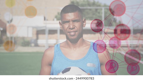 Image of networks of connections over football player with ball. technology, digital interface, sports and competition concept digitally generated image.