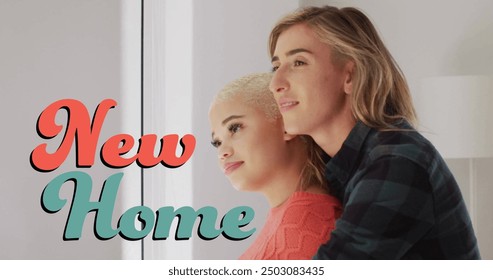 Image of new home text over gay lesbian couple embracing by window at home. New home, love, relationship, property and happiness concept digitally generated image. - Powered by Shutterstock