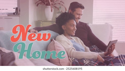 Image of new home text over diverse couple using tablet on sofa. Lifestyle, communication and domestic life concept digitally generated image. - Powered by Shutterstock