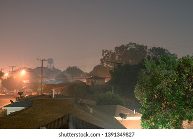 The Image Is A Night Photograph Of My Suburban Neighborhood At Night Which Is Located In Lynwood California. 