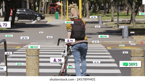 Image of notification bars over albino african american man crossing street with bicycle. Digital composite, multiple exposure, business, transportation, social media reminder and technology. - Powered by Shutterstock