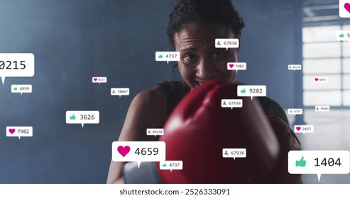 Image of notification bars over diverse female boxer looking at screen and practicing punches. Digital composite, multiple exposure, business, social media reminder and sports concept. - Powered by Shutterstock