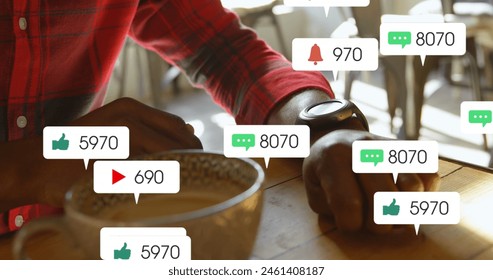 Image of notification bars over midsection of african american man using smartwatch at cafes. Digital composite, multiple exposure, social media reminder and technology concept. - Powered by Shutterstock