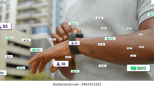 Image of notification bars over midsection of african american man scrolling on smartwatch. Digital composite, multiple exposure, social media reminder and technology concept. - Powered by Shutterstock