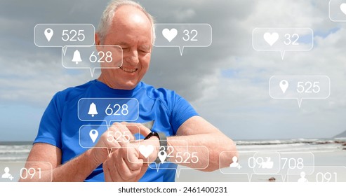 Image of notification bars over senior caucasian man using smartwatch at beach. Digital composite, multiple exposure, social media reminder, retirement and technology concept. - Powered by Shutterstock