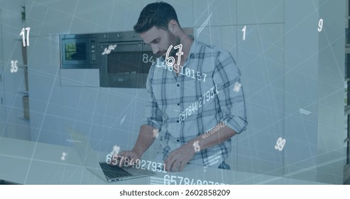 Image of numbers changing and data processing over man using laptop computer. global business and finance concept digitally generated image.